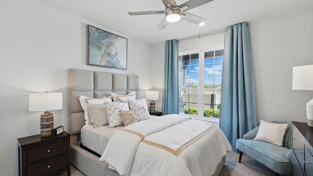Experience plush comfort with exquisite details like a tufted headboard and serene garden views in Green Oaks Preserve. Experience plush comfort with exquisite details like a tufted headboard and serene garden views in Green Oaks Preserve.