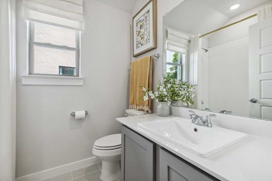 REPRESENTATIVE PHOTO – Bathroom in a Diamond model home by Trophy Signature Homes