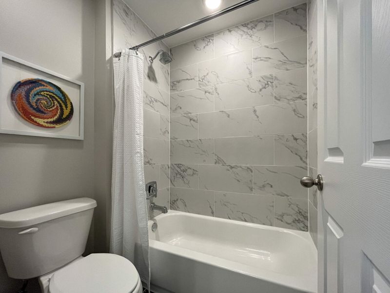 Furnished interior in a model home at Villas San Agustin in Laredo (Image 11).