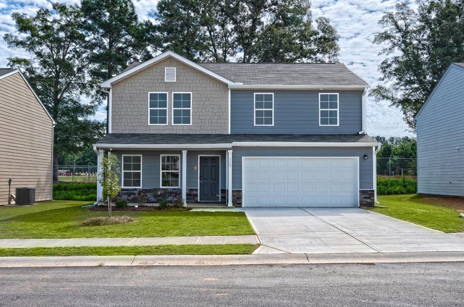 A house with a garage. A house with a garage.