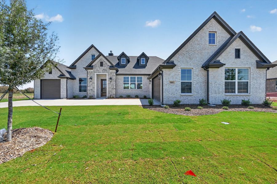 Front exterior of a home in the Paloma Ranches community, located in Justin, TX (Image 3).