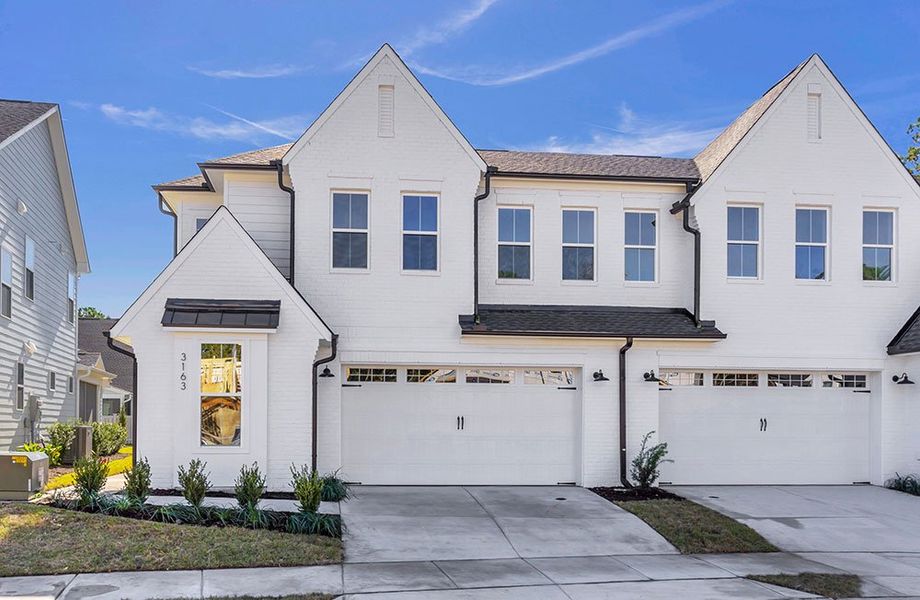 Front exterior of a home in the East & Mason community, located in Wilmington, NC (Image 21).
