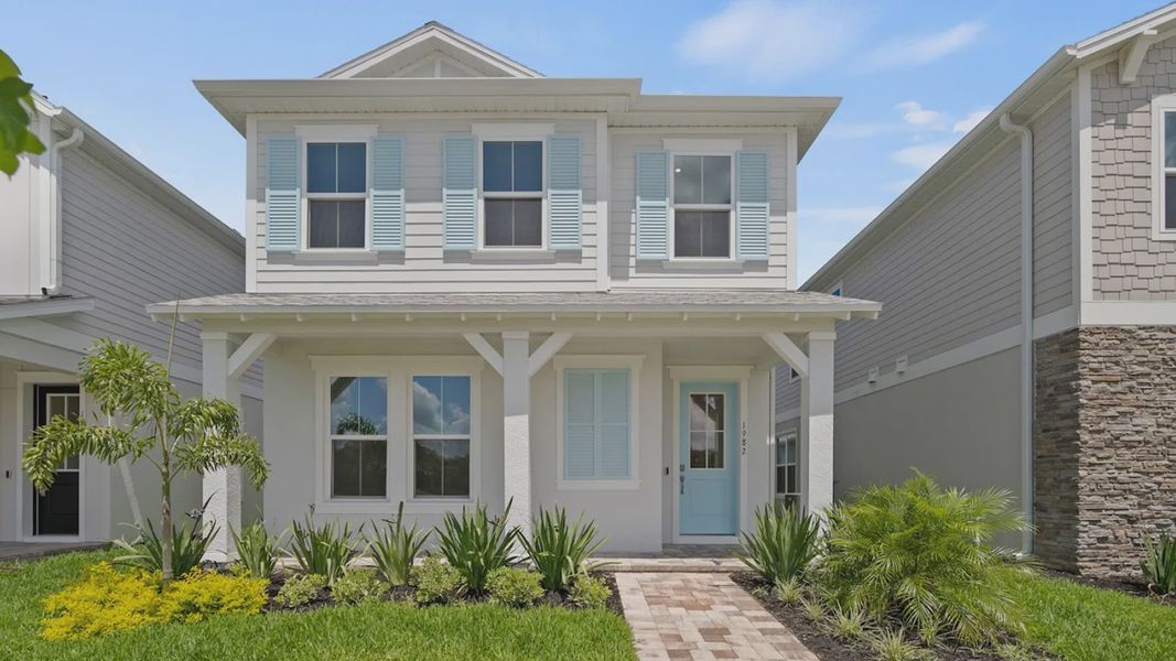 Front exterior of a home in the Trinity Place community, located in St. Cloud, FL (Image 4).
