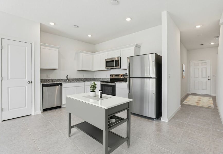 Furnished interior in a model home at Catamaran Cove in Rockledge (Image 6). Furnished interior in a model home at Catamaran Cove in Rockledge (Image 6).