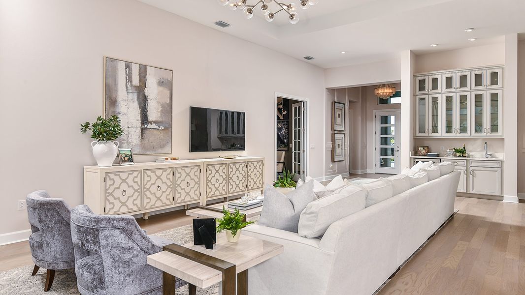 Furnished interior in a model home at Esplanade by the Islands in Naples (Image 65).
