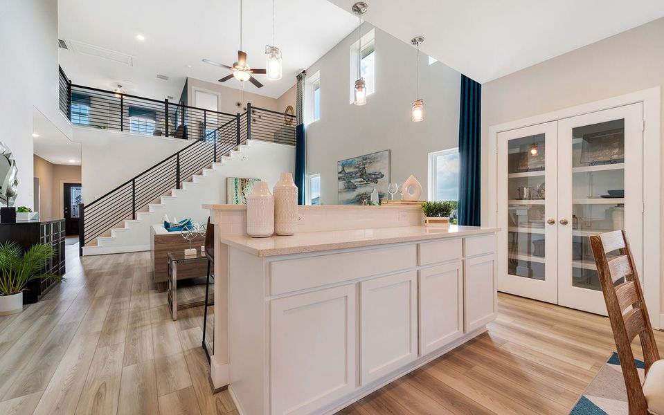 Furnished interior in a model home at Hunter's Ranch in San Antonio (Image 26).