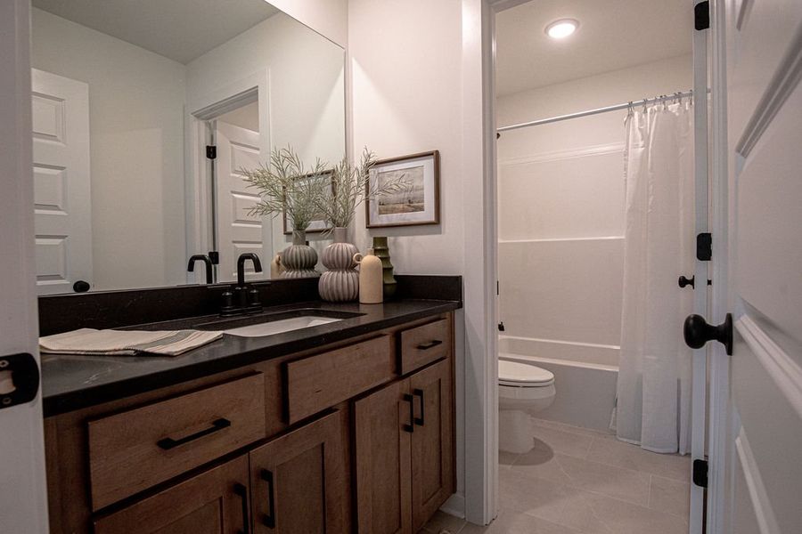 Furnished interior in a model home at The Townhomes at Union Depot in Bartlett (Image 27).