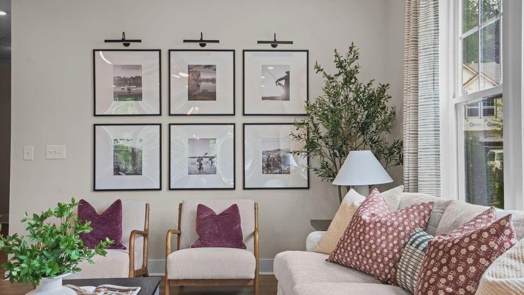 Furnished interior in a model home at North First Street Townes in Mebane (Image 11).