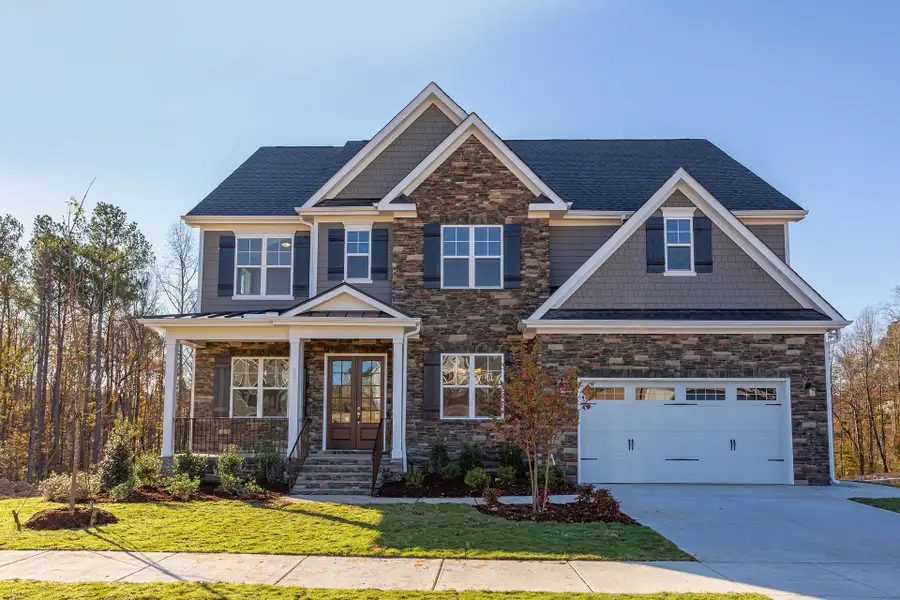 Front exterior of a home in the Sauls Landing community, located in Zebulon, NC (Image 15). Front exterior of a home in the Sauls Landing community, located in Zebulon, NC (Image 15).
