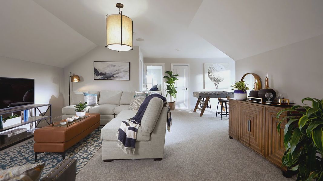 Furnished interior in a model home at The Courtyards on the Greenway in Matthews (Image 10).