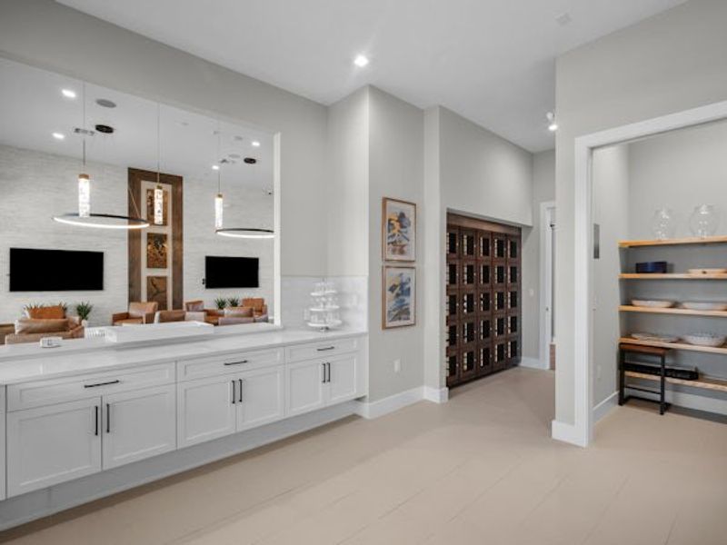 Furnished interior in a model home at BELTERRA in Port St. Lucie (Image 86).