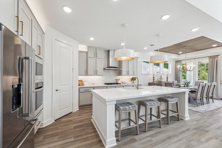Furnished interior in a model home at The Woodlands Hills – 55' in Willis (Image 11).