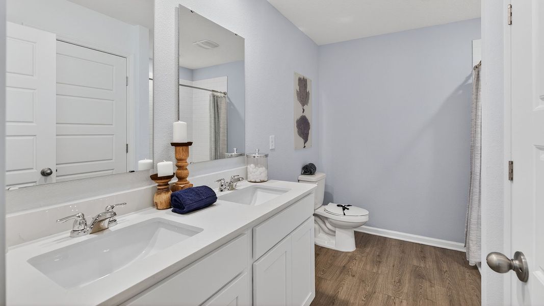 Furnished interior in a model home at Liberty Cove in Yulee (Image 17).
