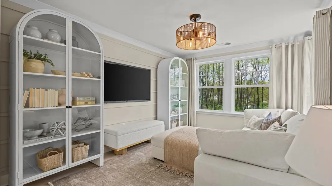 Furnished interior in a model home at Station Pointe Phase 2 in Angier (Image 21).
