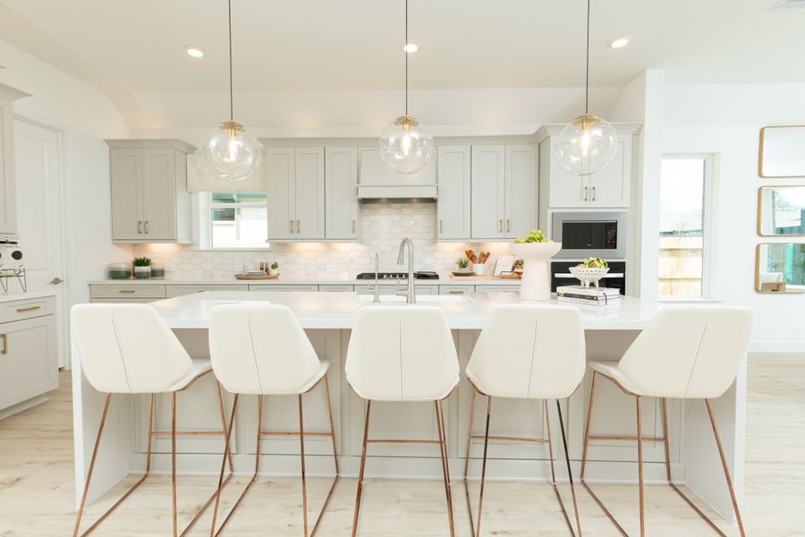 Furnished interior in a model home at Valencia: Hilltop Collection in Manvel (Image 5).