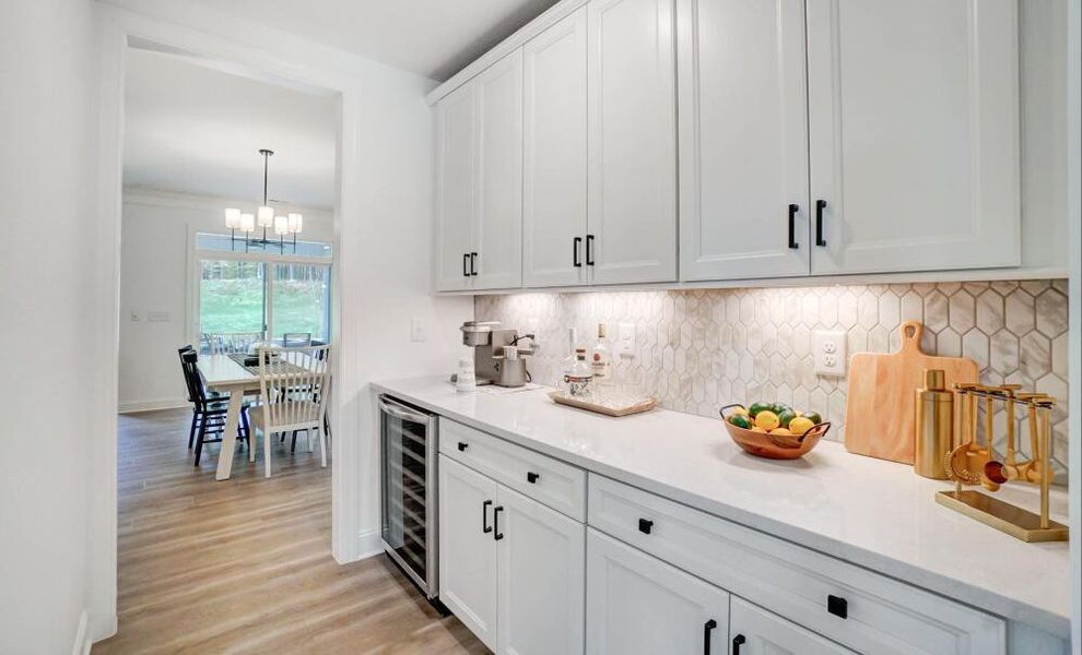 Furnished interior in a model home at Peyton's Creek in Statesville (Image 9).