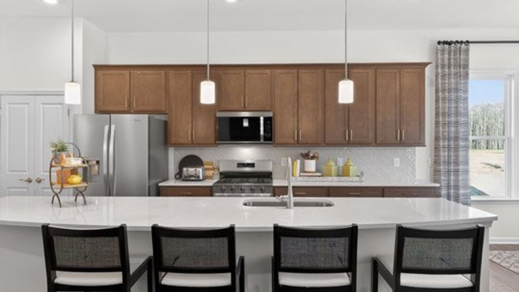 Furnished interior in a model home at The Villas at Galvins Ridge in Sanford (Image 24).