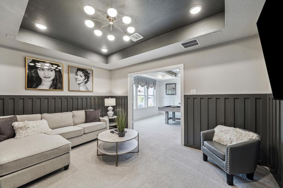 Furnished interior in a model home at The Woodlands Hills – 55' in Willis (Image 21).