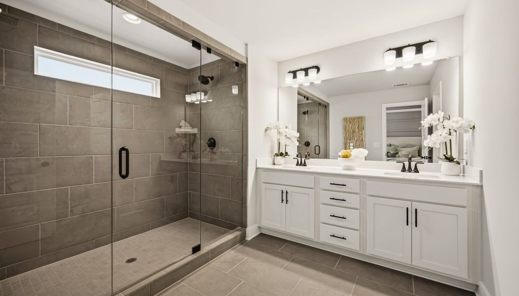 Furnished interior in a model home at Millstone at Mundy Mill in Gainesville (Image 27).