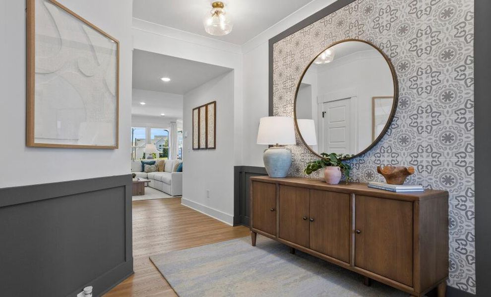 Furnished interior in a model home at The Enclave at Hidden Lake - 55+ Community in Youngsville (Image 4).