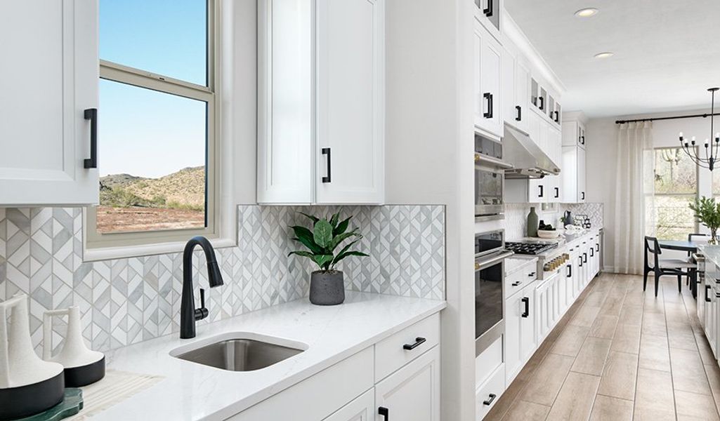 Furnished interior in a model home at Aspire at Sycamore Canyon in Vail (Image 4).