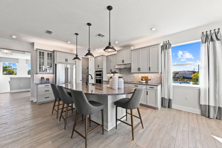 Furnished interior in a model home at Arboretum in Naples (Image 8).