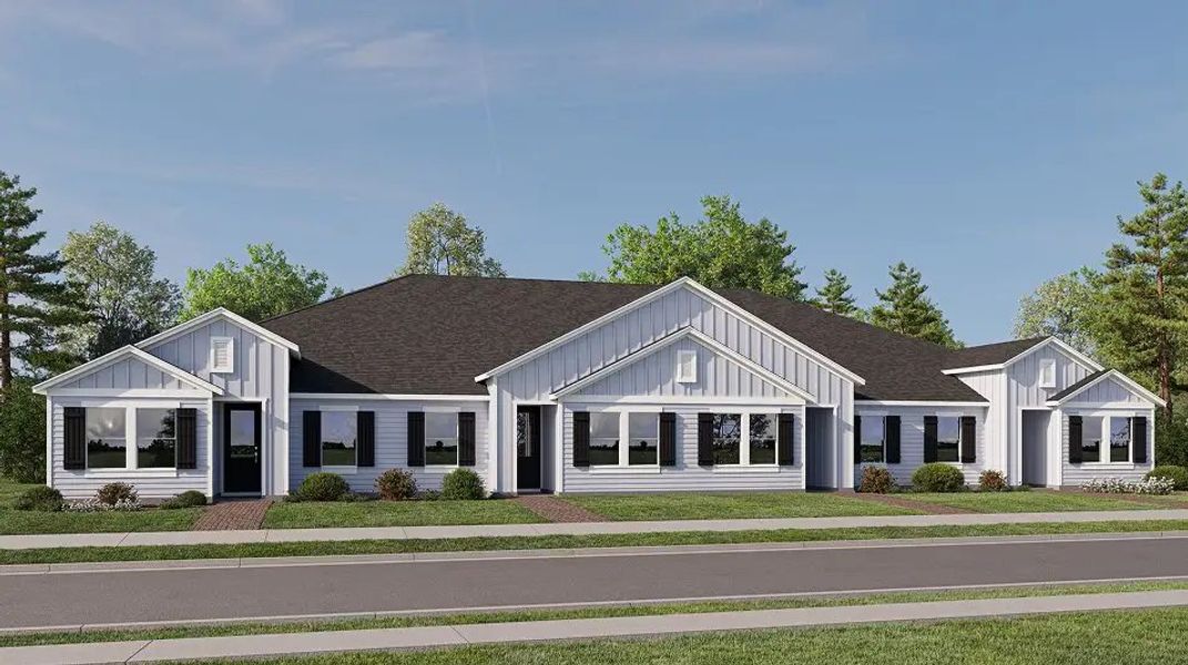 Front exterior of a home in the Sanctuary at Wellness Ridge: Vineyard community, located in Clermont, FL (Image 7).
