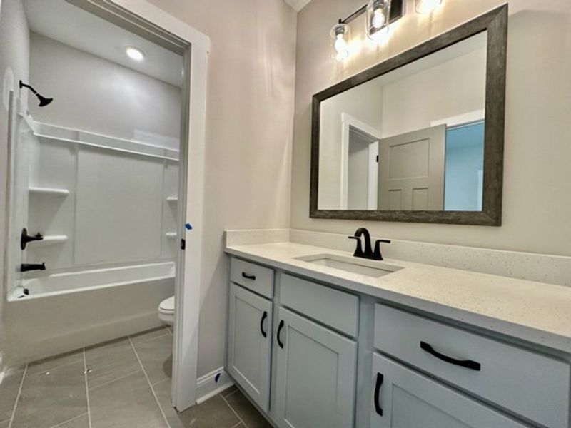 Furnished interior in a model home at Triple Park in Moreland (Image 8).