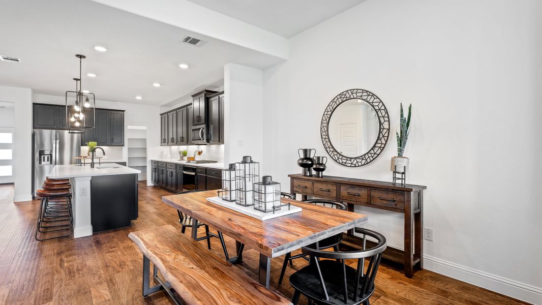 Furnished interior in a model home at Whitewing Trails in Princeton (Image 7).