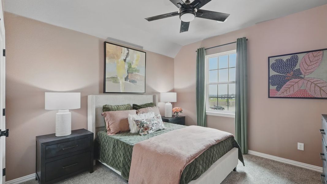 Experience refined luxury with modern ceiling fan, plush bedding, and serene hues in Westridge.