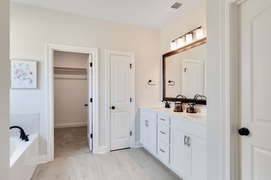 Furnished interior in a model home at Houston Place in Crestview (Image 8).