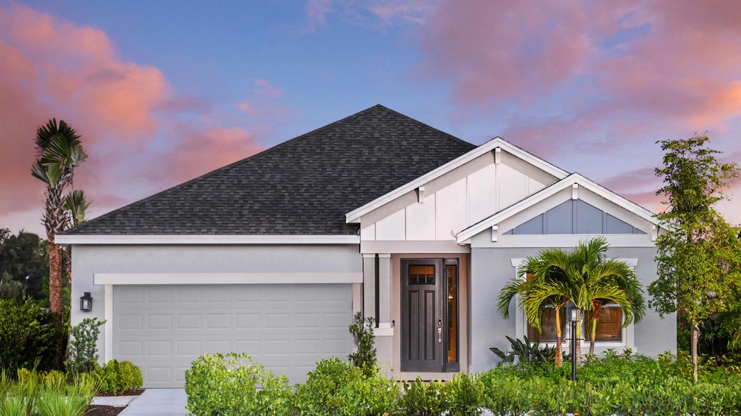 Front exterior of a home in the Tiburon community, located in Nokomis, FL (Image 12).