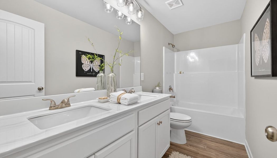 Furnished interior in a model home at The Reserve at Clocktower in Douglasville (Image 23).