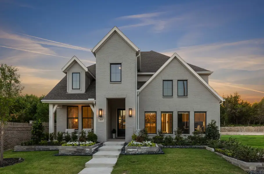 Front exterior of a home in the Cross Creek Meadows community, located in Celina, TX (Image 4). Front exterior of a home in the Cross Creek Meadows community, located in Celina, TX (Image 4).
