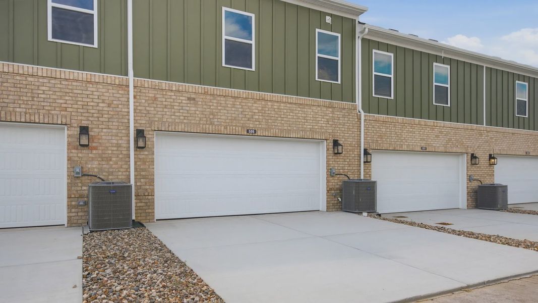 2-Car garages at the back of the home, offering tons of storage and parking space