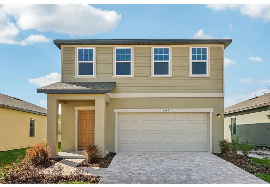 Front exterior of a home in the Landings at Mount Olive community, located in Polk City, FL (Image 2). Front exterior of a home in the Landings at Mount Olive community, located in Polk City, FL (Image 2).