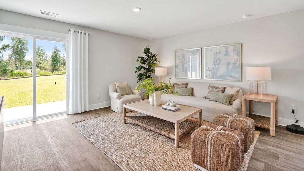 Furnished interior in a model home at Saltgrass Landing in Winnabow (Image 11).