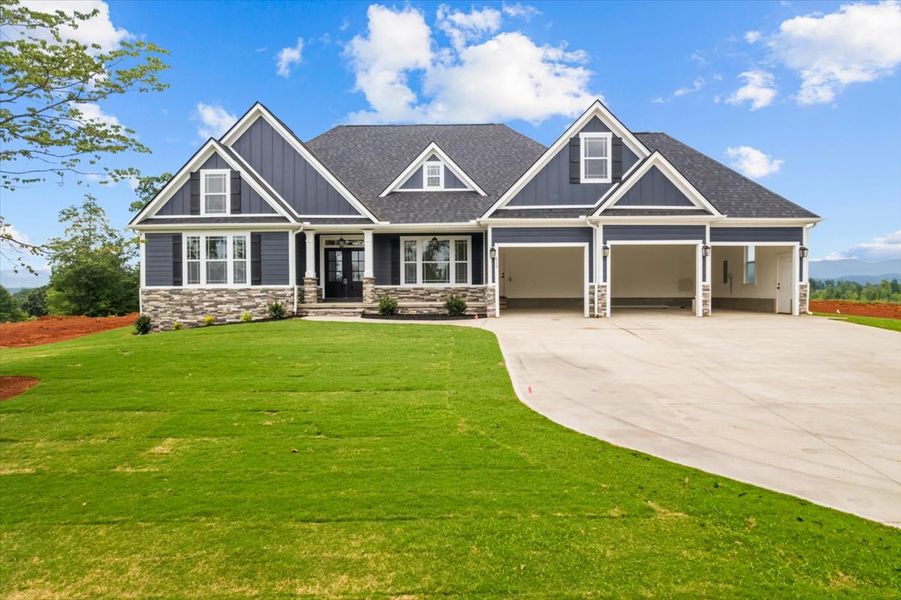 Front exterior of a home in the Lakeside at Blue Ridge Plantation community, located in Taylors, SC (Image 2).