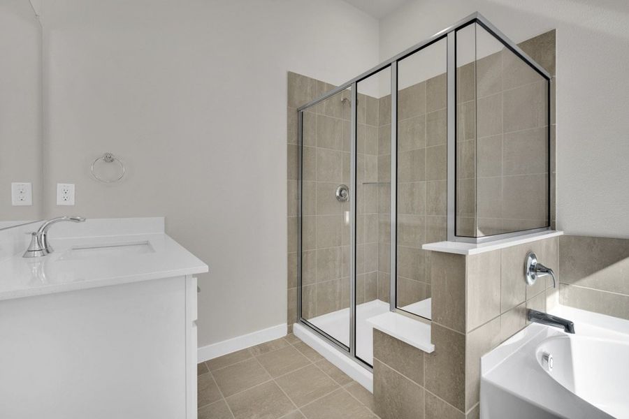 Furnished interior in a model home at South Meadow in Melissa (Image 13).