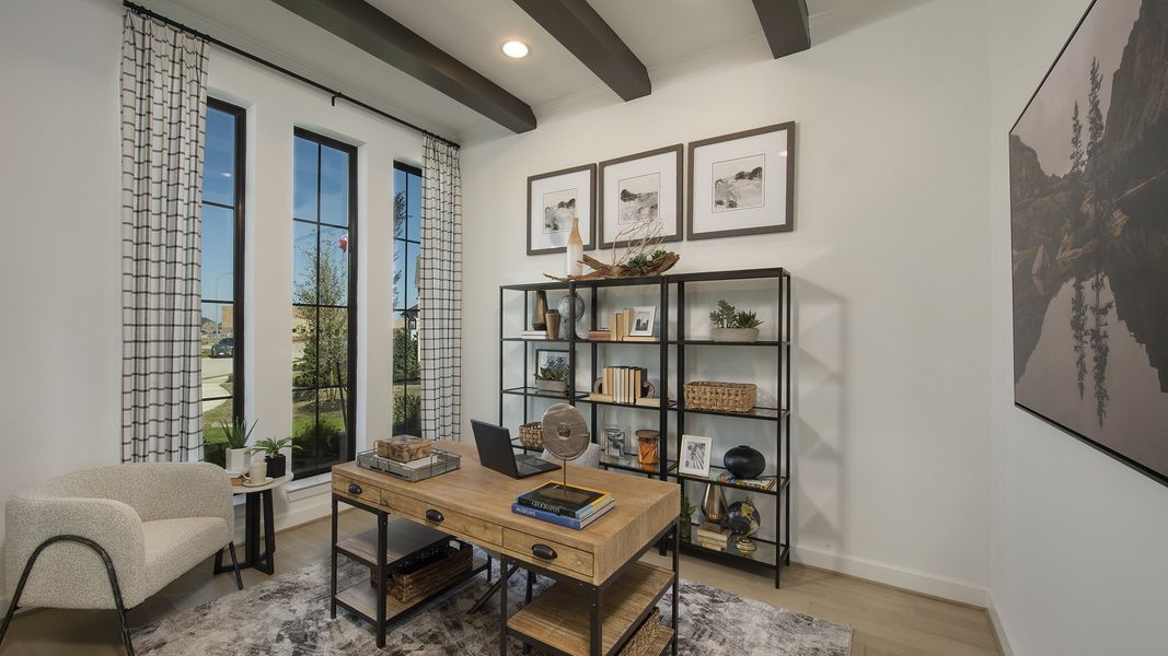 Furnished interior in a model home at Cane Island 80' in Katy (Image 10).