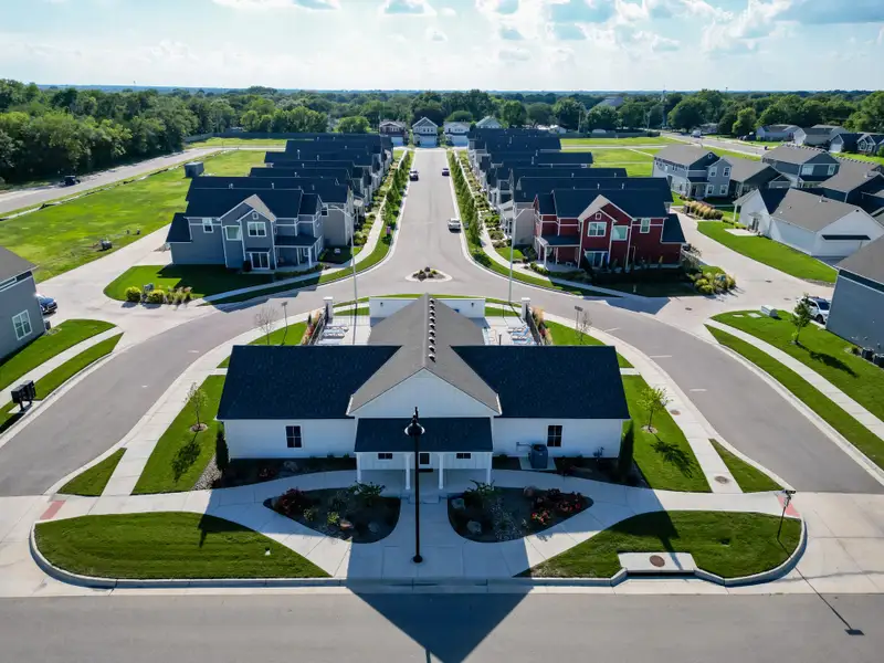 Aerial view of the Heritage Commons community in Andover, KS, showing layout and nearby surroundings (Image 1). Aerial view of the Heritage Commons community in Andover, KS, showing layout and nearby surroundings (Image 1).