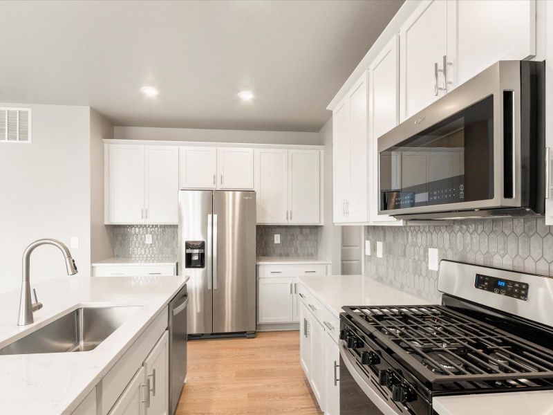 Furnished interior in a model home at Hidden Valley Farm in Severance (Image 1).