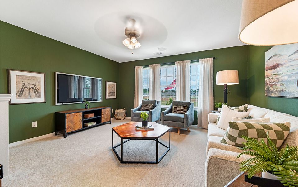 Furnished interior in a model home at The Pines at Seven Coves in Willis (Image 28).