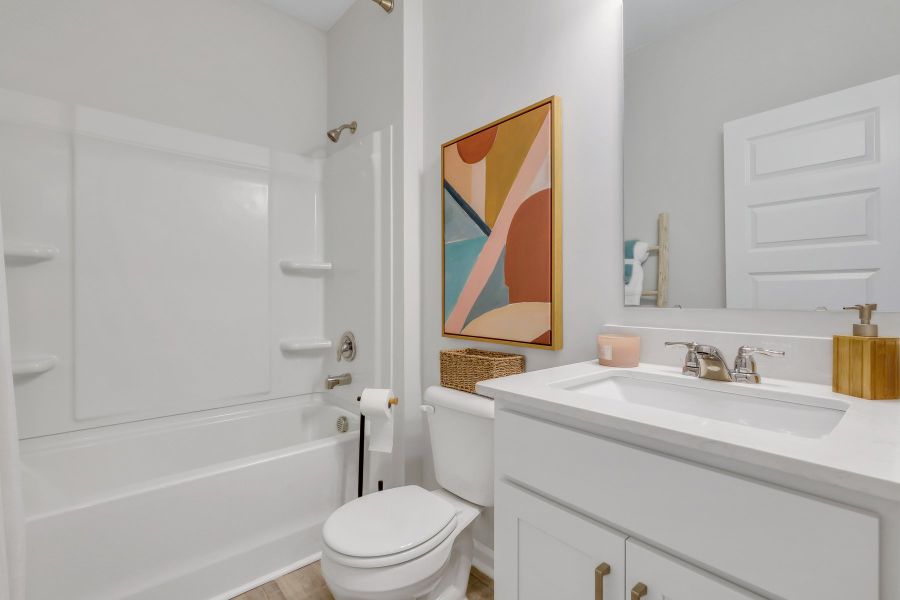 Furnished interior in a model home at Westbrook Retreat Villas at Savannah Quarters in Pooler (Image 26).