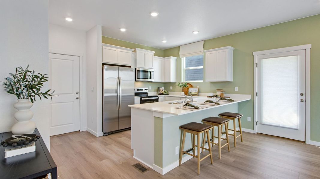 Furnished interior in a model home at Tailholt in Severance (Image 6).