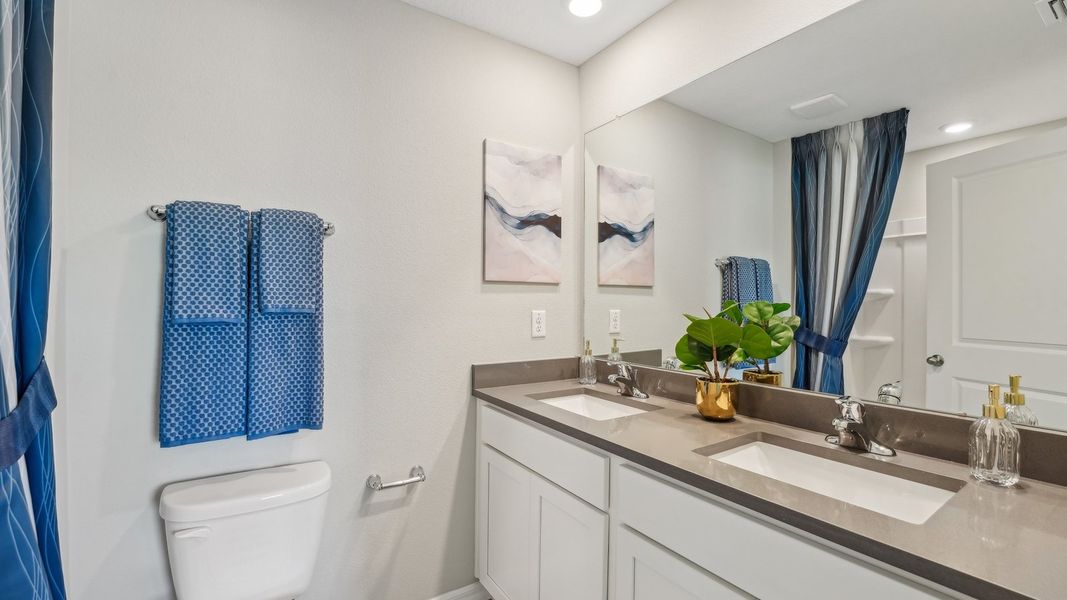 Furnished interior in a model home at Sunset Hills in Summerfield (Image 24).