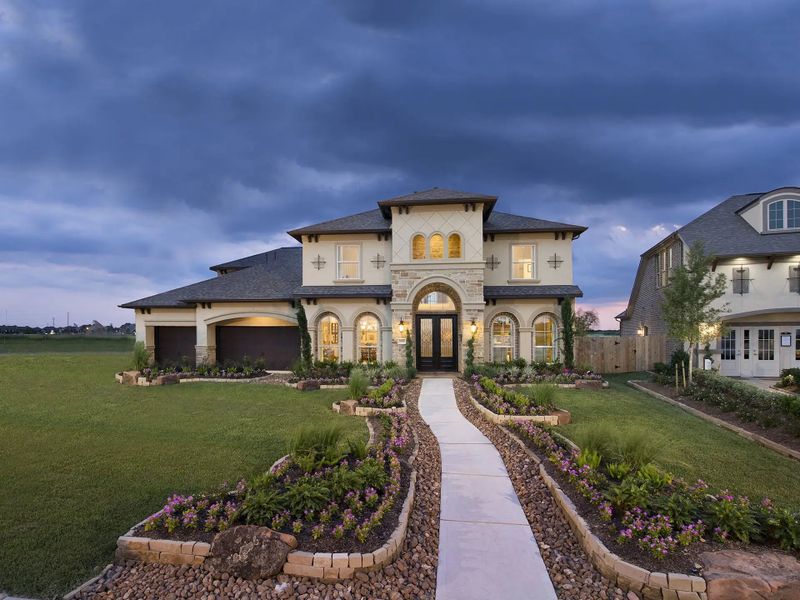 Front exterior of a home in the Lakes Of Cane Island 80' community, located in Katy, TX (Image 3).