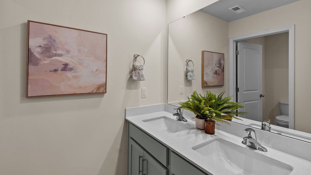 Furnished interior in a model home at The Preserve at Kinsley in Jamestown (Image 23).