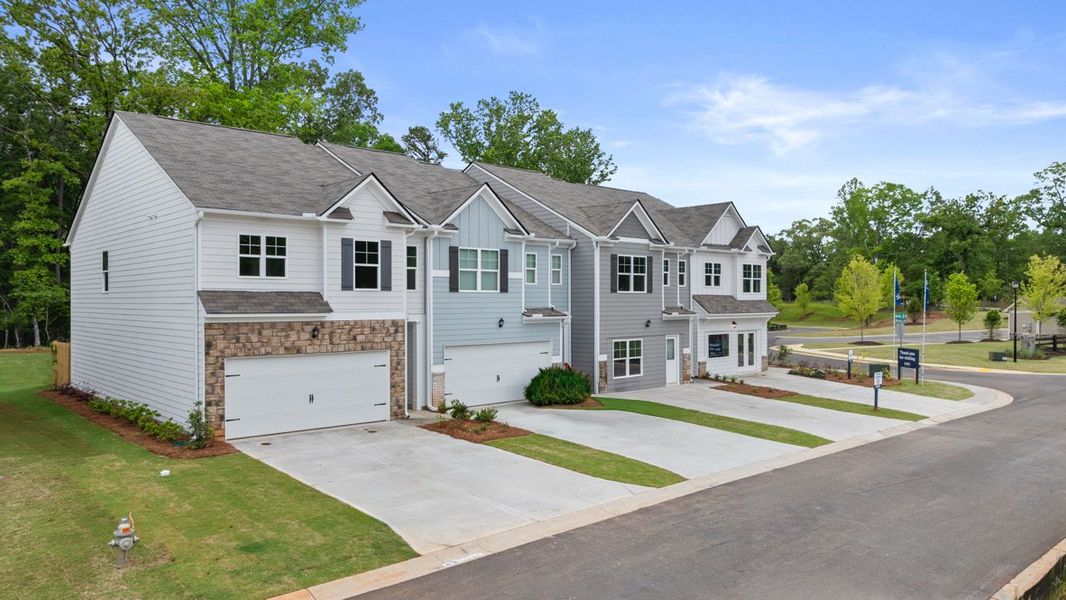 Front exterior of a home in the Falcon Landing Townhomes community, located in Gainesville, GA (Image 12).