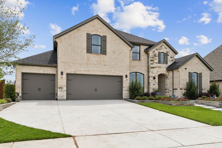 Front exterior of a home in the Sweetgrass 65s community, located in Haslet, TX (Image 2).